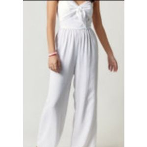 Trista Pom Front Tie Jumpsuit; AudreyParks + Francesca's, size S